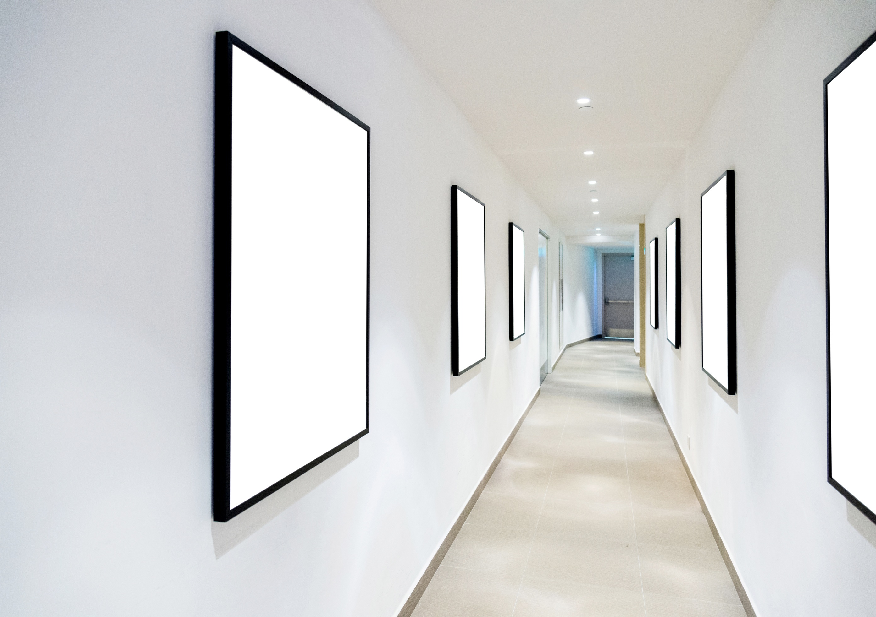 Blank frames on the wall of the corridor